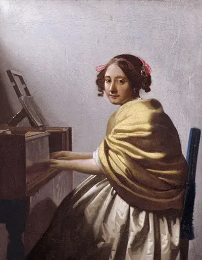A Young Woman Seated at the Virginal Vermeer